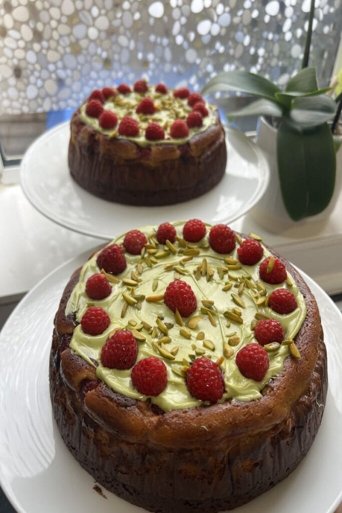 Rich Brownie Pistachio-Raspberry Basque Cheesecake with a Caramelized Crust